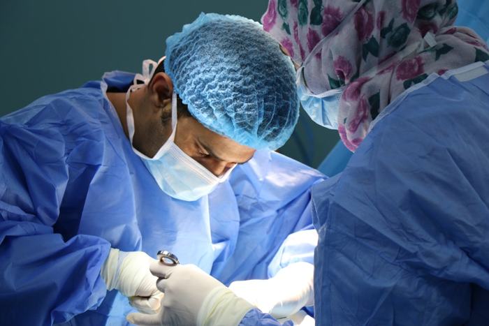 A surgical team operating